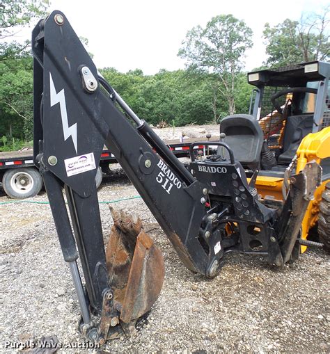 2014 bradco skid steer bucket with teeth|bradco skid steer backhoe attachment.